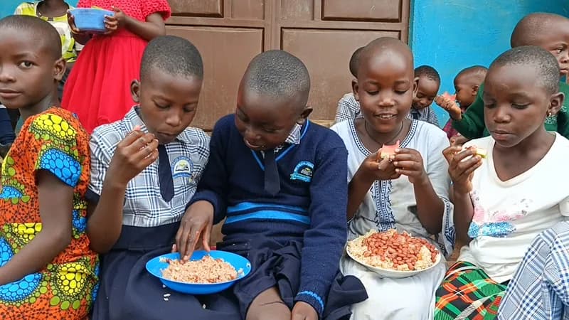 Students sharing a meal at His Grace Junior School